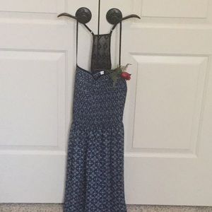 Sundress with T-back and gathered bust.